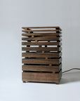 handcrafted table lamp made of walnut