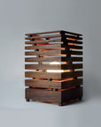 handcrafted table lamp made of walnut