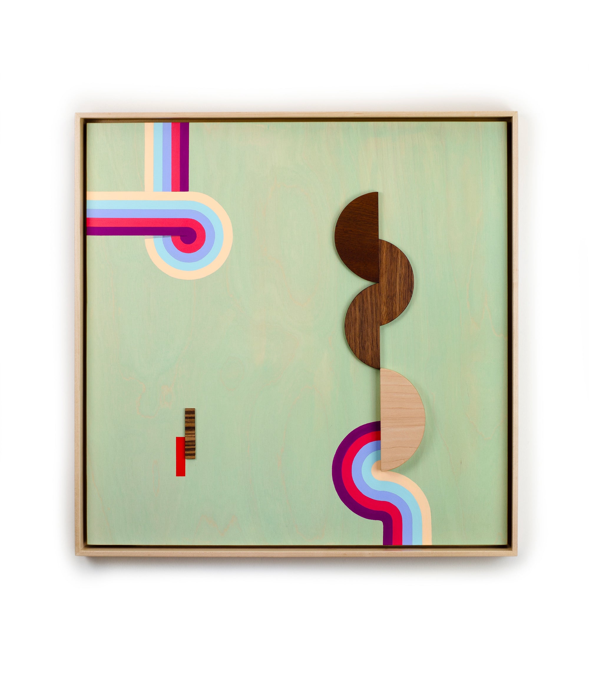 Abstract art piece with colorful geometric shapes on a light green background